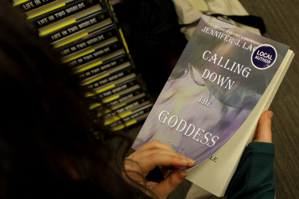 The photo is looking down on a book someone is holding.